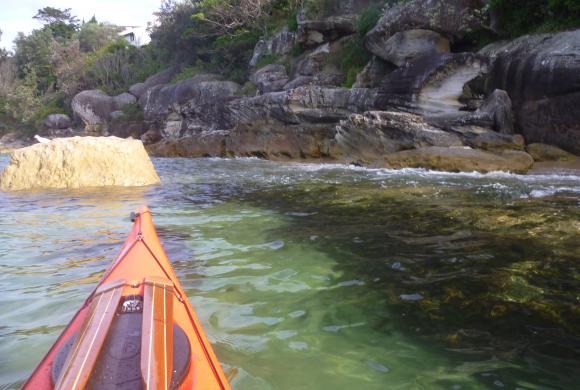 Clear water and shallow rock ledges