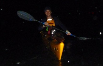Ned paddling through the rain