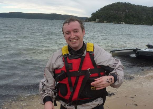 Grumm, laughing after robbing Team Fat Paddler of its two podium places by deciding to take a swim in Pittwater instead. WHAT'S SO FUNNY GRUMM???