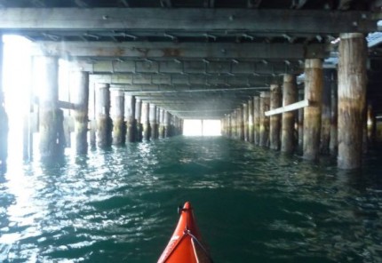 Paddling under Luna Park. Timbo surfed through this lane!