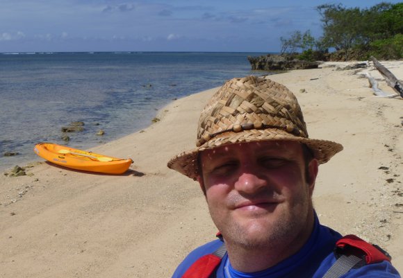 A sunburnt FP admires his deserted tropical beach
