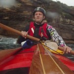 Important rules when paddling near cliffs - always wear a helmet... and an ugly shirt.