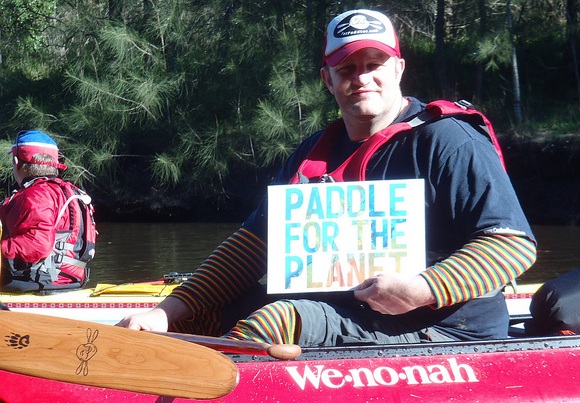Captain FP in the TFP flagship Wenonah Canoe, Paddling for the Planet