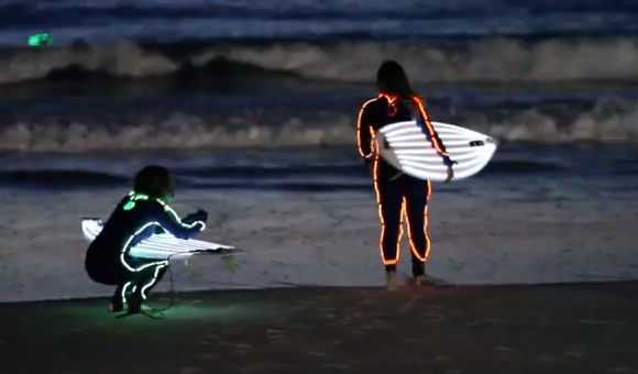 Neon surfers at Australia's iconic Bondi Beach. Local's refer to them as "shark bait"...