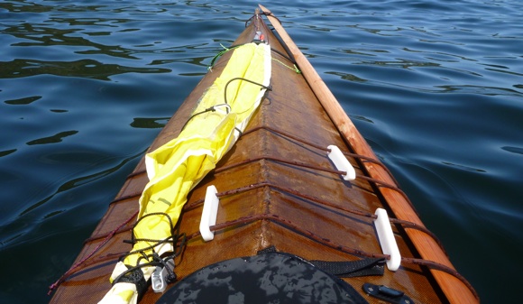 The view from the cockpit - note the spare paddle and kayak sail ready for use