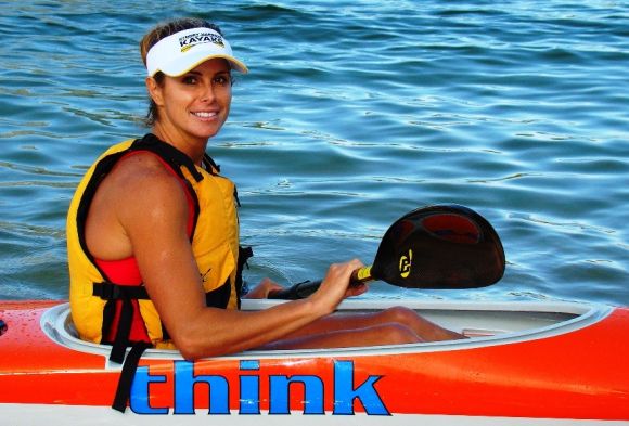 Candice teaches paddling skills to aspiring ski paddlers on the beautiful Sydney Harbour