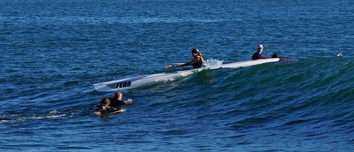 Kassie charging her first wave