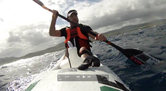 Nat paddling off the Mauritian reef