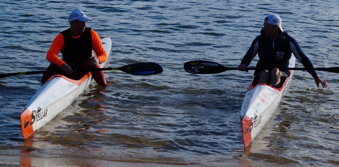 Stellar surfski paddlers Gavin Clark and Matt O'Garey comparing skis