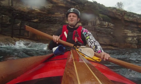 Important rules when paddling near cliffs - always wear a helmet... and an ugly shirt.